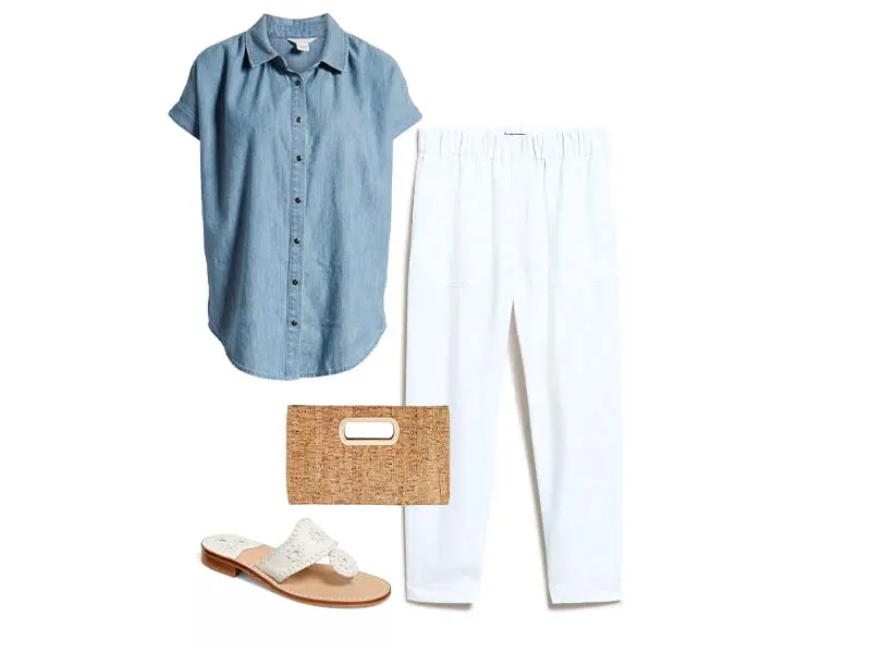 White linen pants, chambray top, white leather sandals, and cork clutch