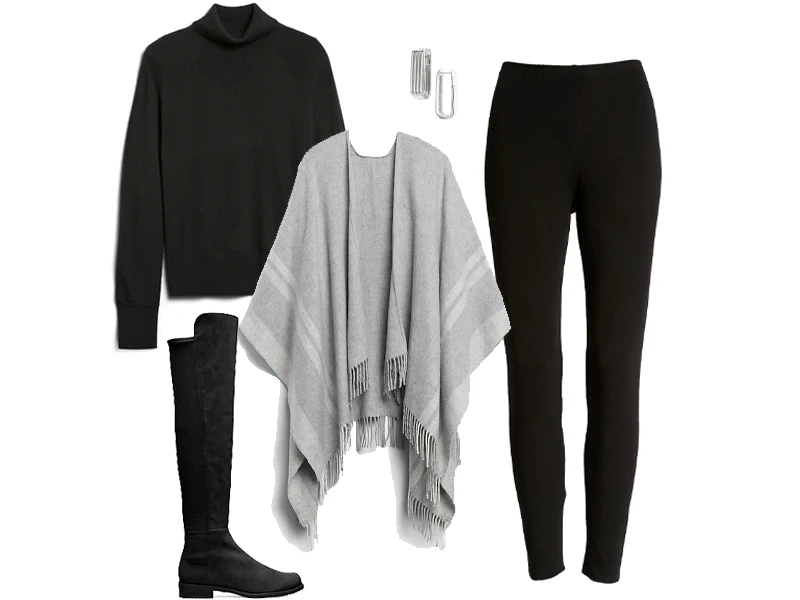 Black leggings, black turtleneck sweater, gray wool poncho, silver hoops earings, and black over the knee boots. 