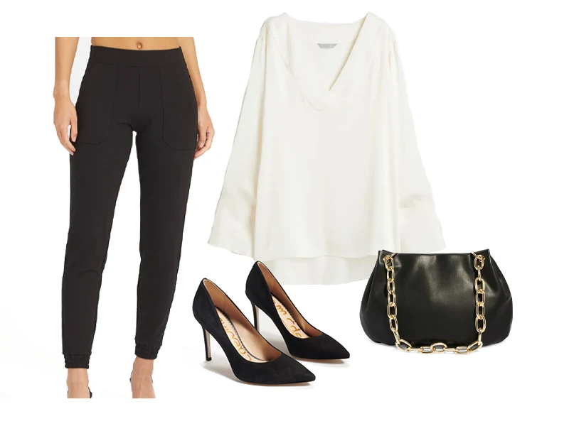 Black Joggers, white satin v neck shirt, black suede heels, and black shoulder bag with gold chain handle