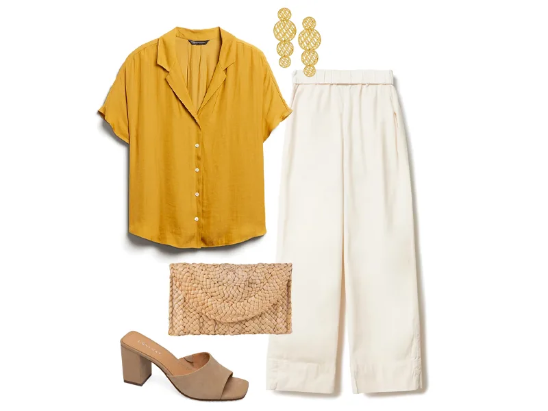 yellow camp shirt, tan easy pants, tan slide heels, straw clutch, and gold drop earrings.