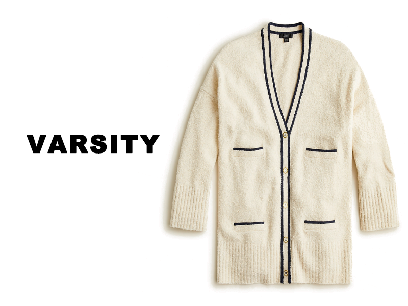 Cream colored varsity sweater