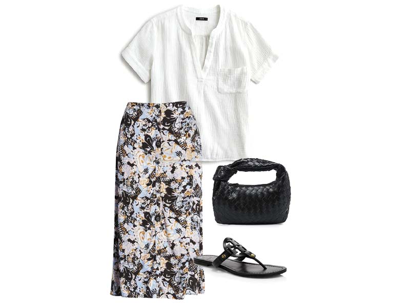 White gauze top, black floral midi shirt, black leather sandals, and a black woven bag