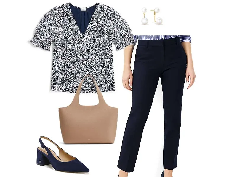 Floral puff sleeve top, navy pants, pearl ear jackets, navy slingbacks, and tan leather tote