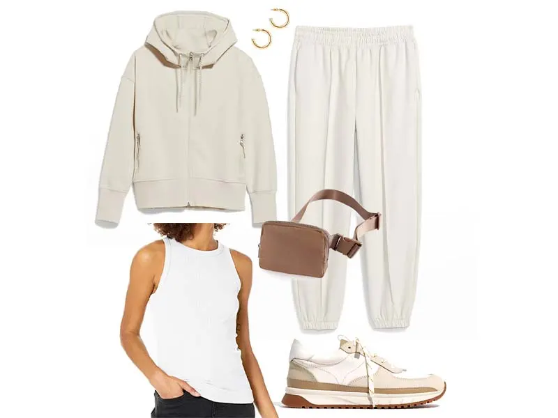 Colorblock sneakers with cream sweatsuit, gold hoops, brown belt bag, and white tank