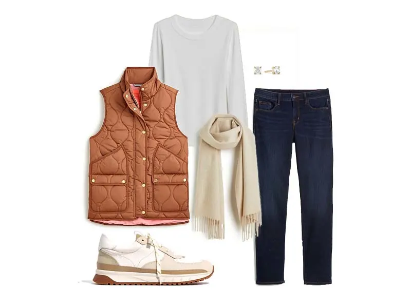 Colorblock sneakers, brown quilted vest, beige scarf, white tee, topaz studs, and dark straight jeans