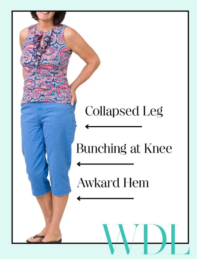 Woman in blue capri pants showing poor fit: collapsed leg, knee bunching, and awkward hem. Highlights why capris are unflattering.