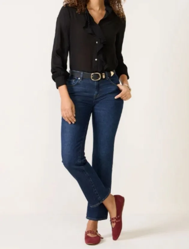 Dark wash straight leg jeans styled for women over 40, a classic everyday denim option