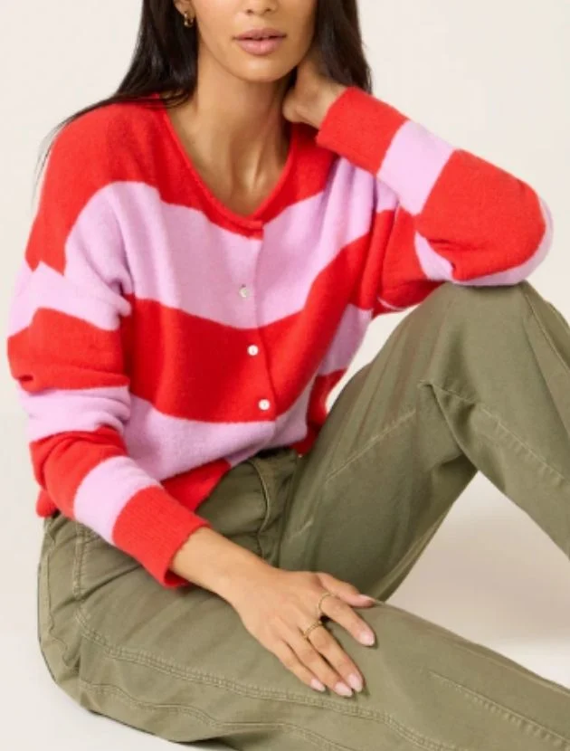 Pink and red striped cardigan styled with casual pants, an easy layering piece for women over 40