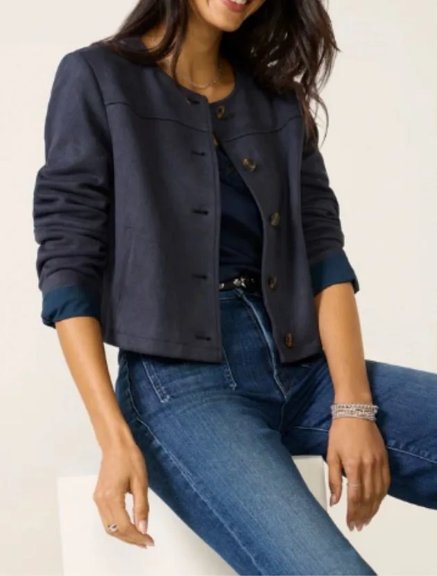 Navy faux suede jacket styled with jeans, an easy layering piece for women over 40