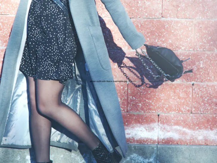 Sheer-look tights styled with a winter dress and coat, showing how fleece-lined tights fit into cold weather outfits.