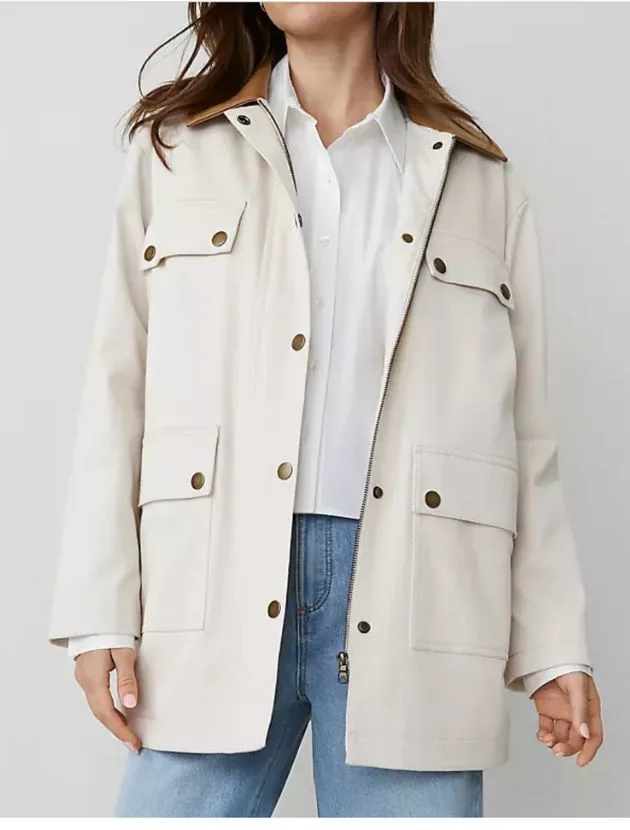Woman wearing Ann Taylor Weekend Collection natural canvas jacket with faux leather collar and utility pockets