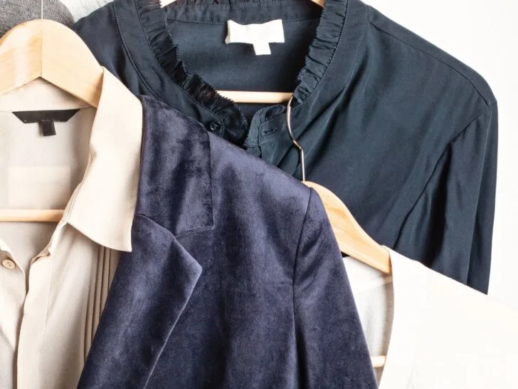 organized wardrobe with blazers and neutral basics illustrating how to shop your closet