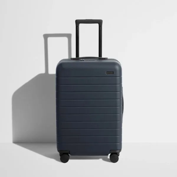 Away carry-on suitcase used for organized and efficient travel packing