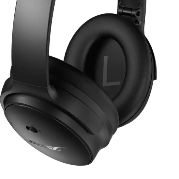 Bose noise canceling over ear headphones used to block sound during carry on travel and flights