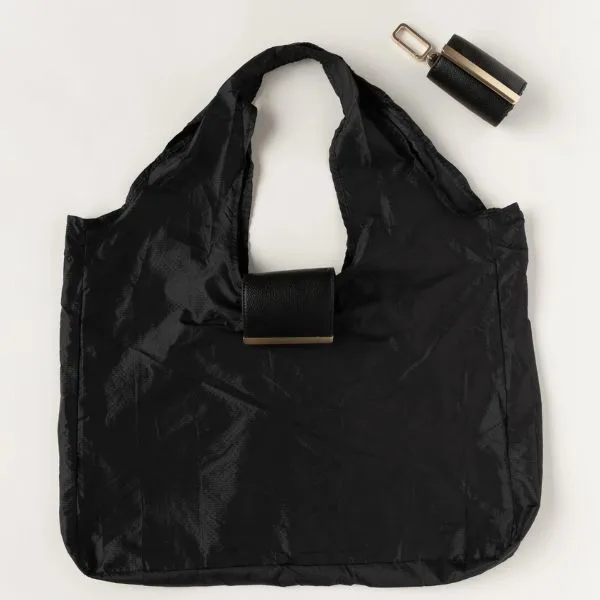 Keote keychain tote folded and unfolded as a packable carry-on travel bag