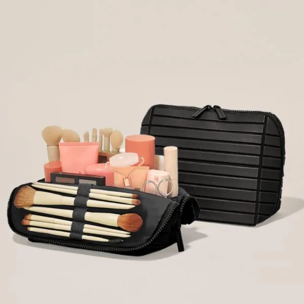 Paravel traveler makeup bag with brushes and beauty products, organized for carry-on travel