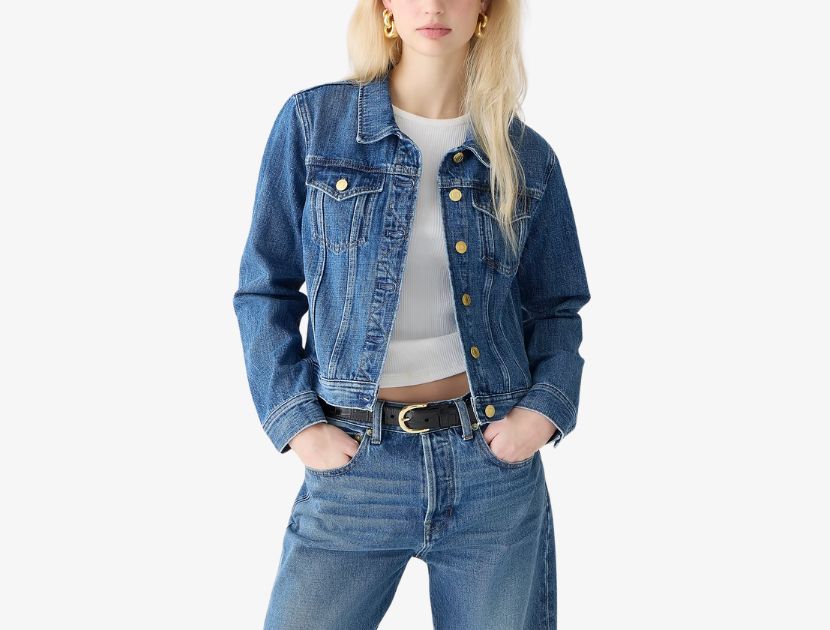 Woman wearing J.Crew New Classic Denim Jacket in medium Bianca wash, a versatile fall layering piece for women over 40.
