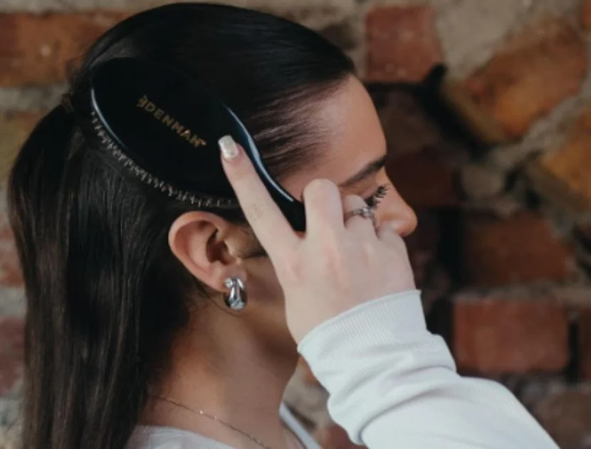 Gentle hair brush smoothing fine hair to reduce breakage and tension