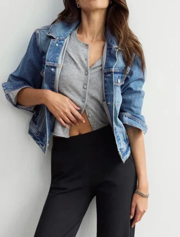 AYR Ride or Fly denim jacket styled with black trousers, a polished casual jacket for women over 40