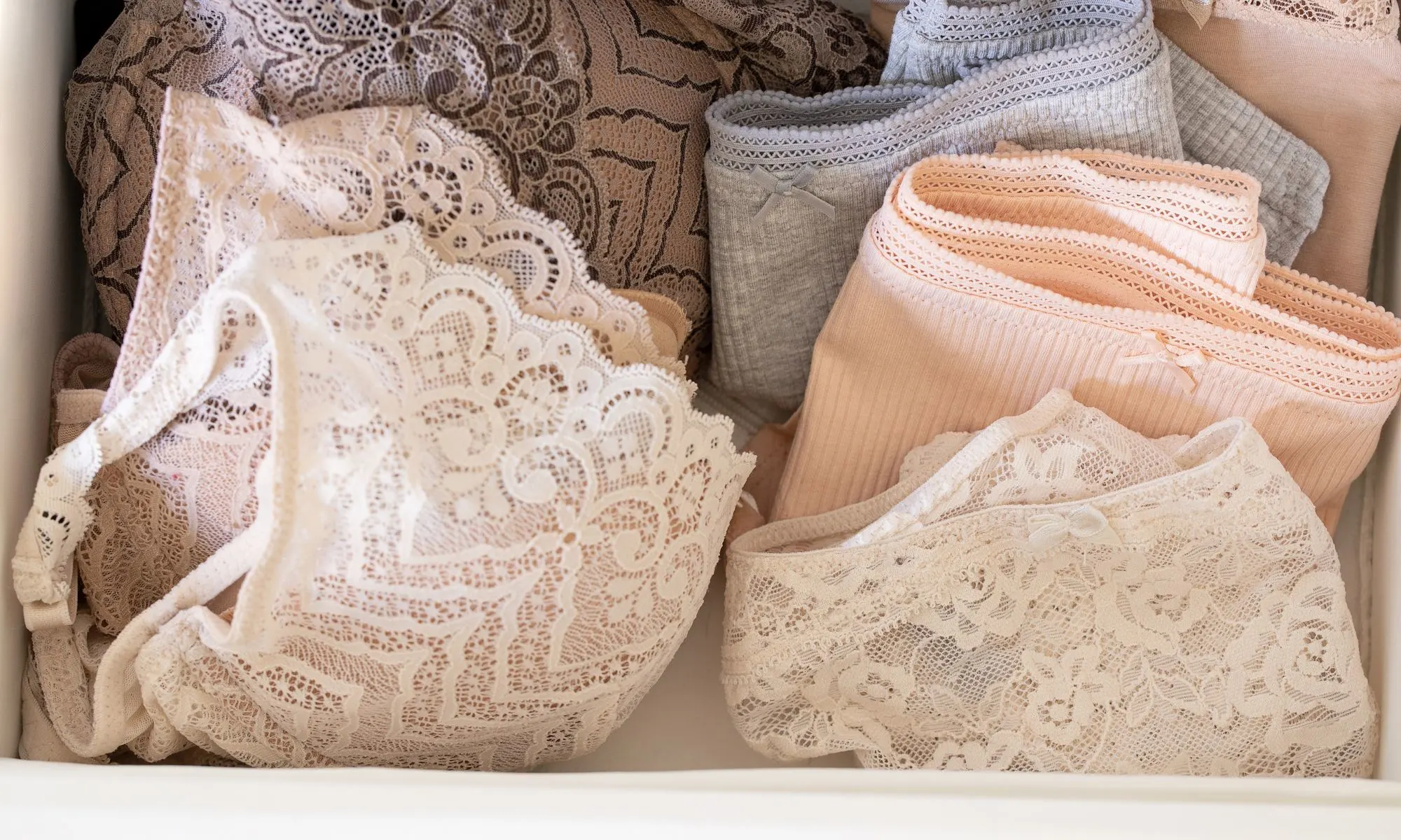 Neutral-toned bra and underwear demonstrating proper undergarment fit for women over 40