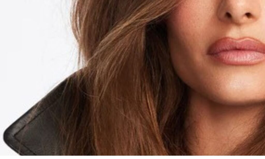 woman with glossy blowout using Chris McMillan hair products