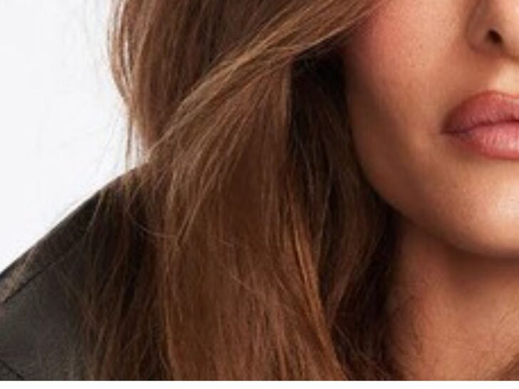 woman with glossy blowout using Chris McMillan hair products