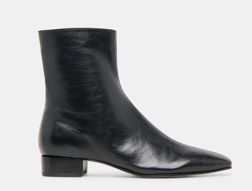 Dolce Vita Tarine Bootie in black leather with a pointed toe and one-inch stacked heel